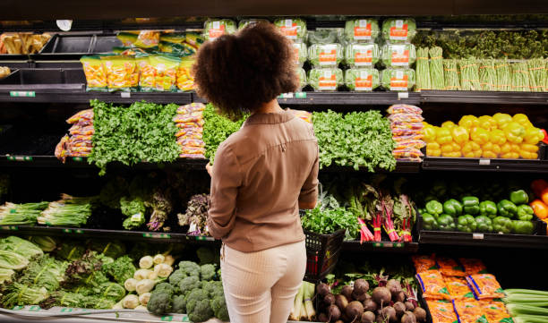 WOMAN IN THE PRODUCE SECTION